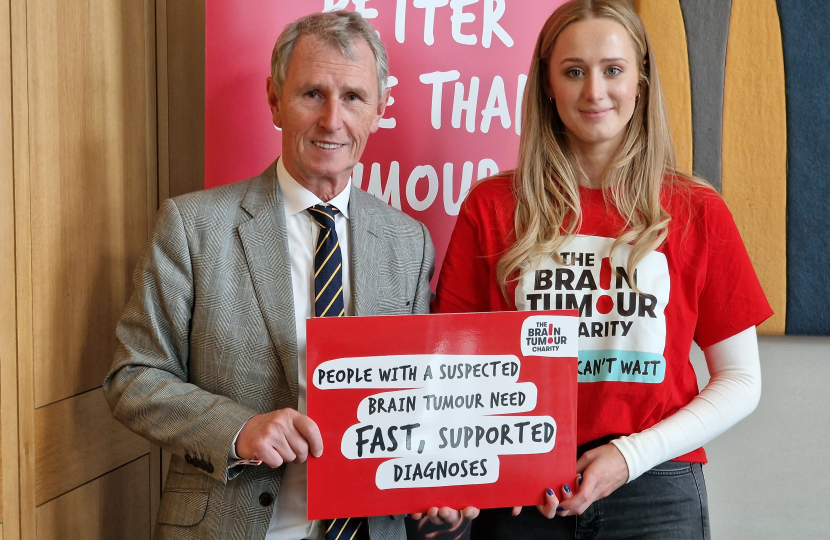 Pictured - Nigel Evans supporting the Brain Tumour Charity's campaign