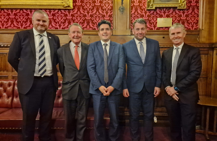 MPs pictured with the Minister 