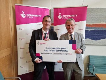 Nigel Evans Pictured with National Lotter Fundraising Officer Tom Pine