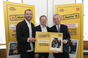 Nigel photographed with representatives from McDonalds and Children in Need