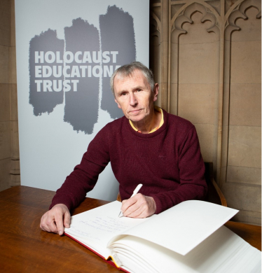 Nigel Evans MP pictured signing the Holocaust Memorial Day Book of Commitment