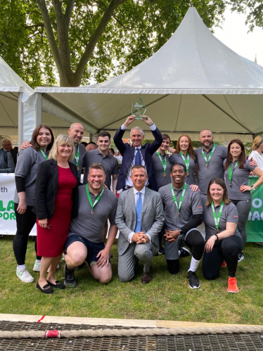 Nigel Evans (above) with the winning team 